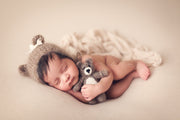 small felted baby bear with baby girl and bear hat for newborn photography