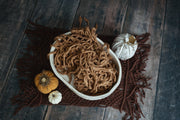 brown woven, chunky, fringe newborn or baby accent prop