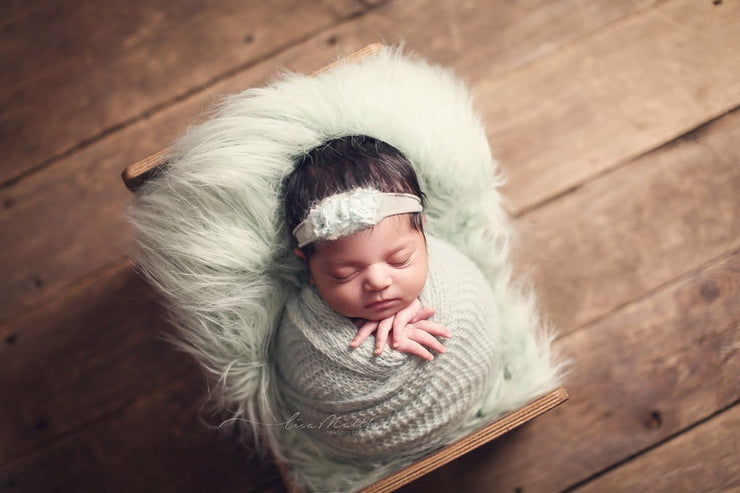light green, straight, faux fur photo props with little girl