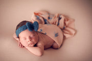 teal blue mohair bow turban on girl with peach floral wrap for baby photos