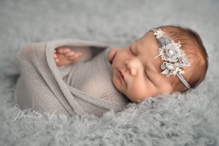 newborn in gray wrap photo prop 
