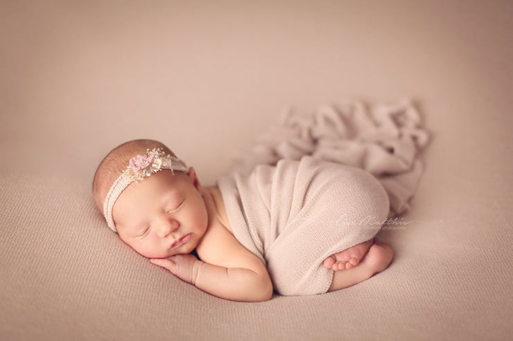 super soft pink stretch pink posing cloth for newborn poser with newborn girl and headband