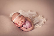 super soft pink stretch pink posing cloth for newborn poser with newborn girl and headband, felted dad heart