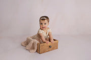 fabric backdrop in pink shades with little girl inside drawer photography prop