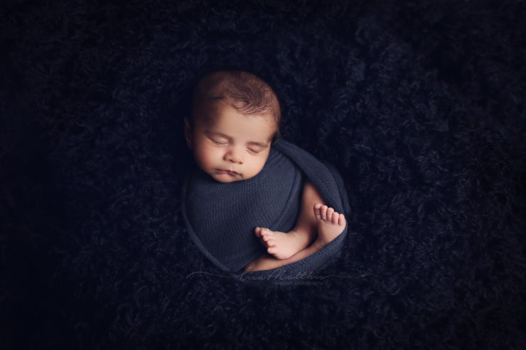 really dark navy blue, curly, newborn baby faux fur fabric with baby boy swaddled in blue wrap photography props