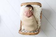 cream flower and lace headband on baby with tan stretch wrap photo prop