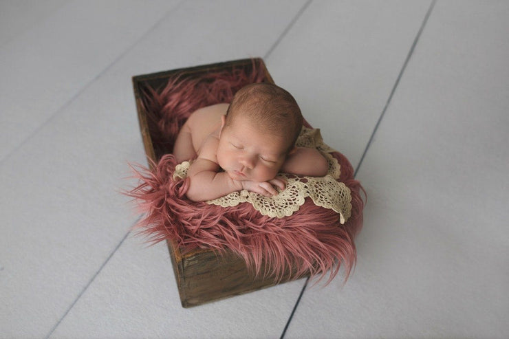 Newborn Girl in a Basket with Pink Faux Flokati Fur Photo Prop