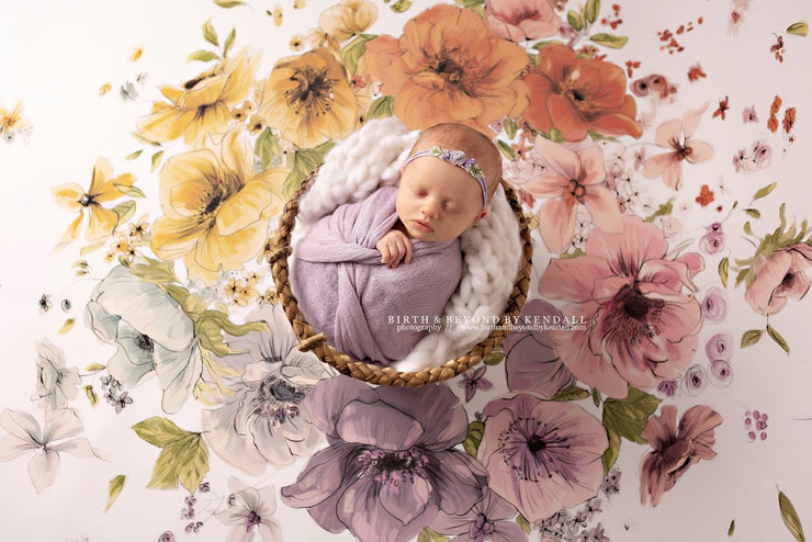 newborn baby girl in bowl with flowers around her I printed paper or fabric backdrop by custom photo props