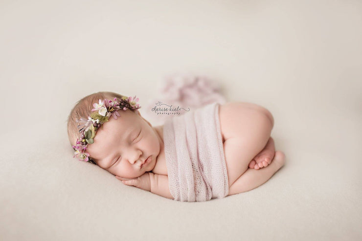 newborn wrapped in dream wrap photo prop